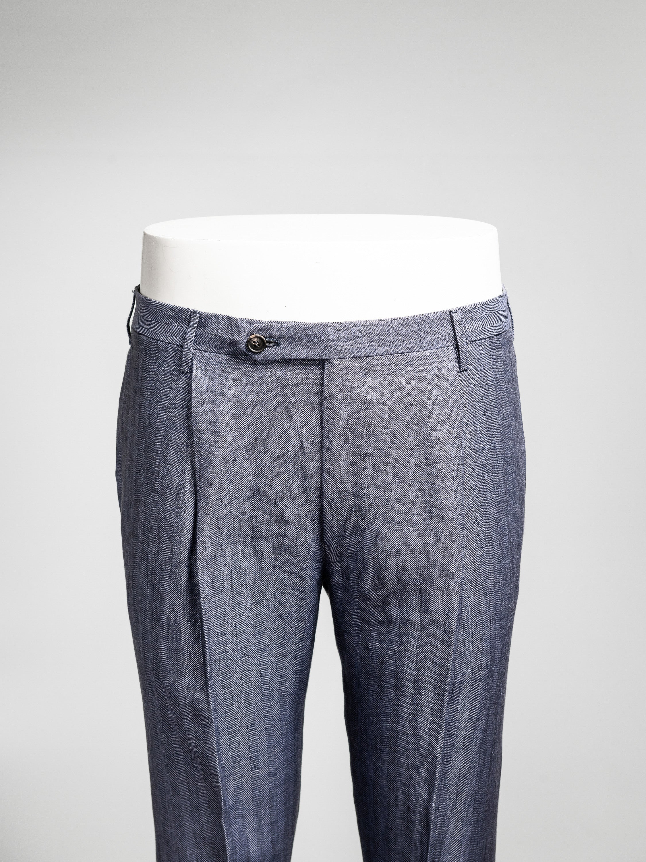 Medium blue herringbone pair of regular fit linen trousers